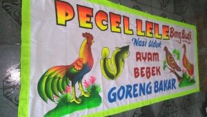 Melukis Spanduk Pecel Lele Khas Lamongan